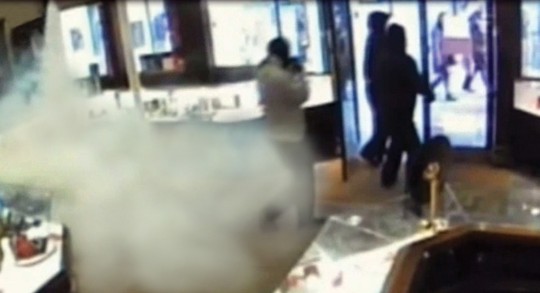 Smoke Screen forcing out jewellery store robbers