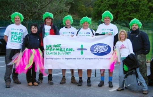 Macmillan fundraisers in green wigs
