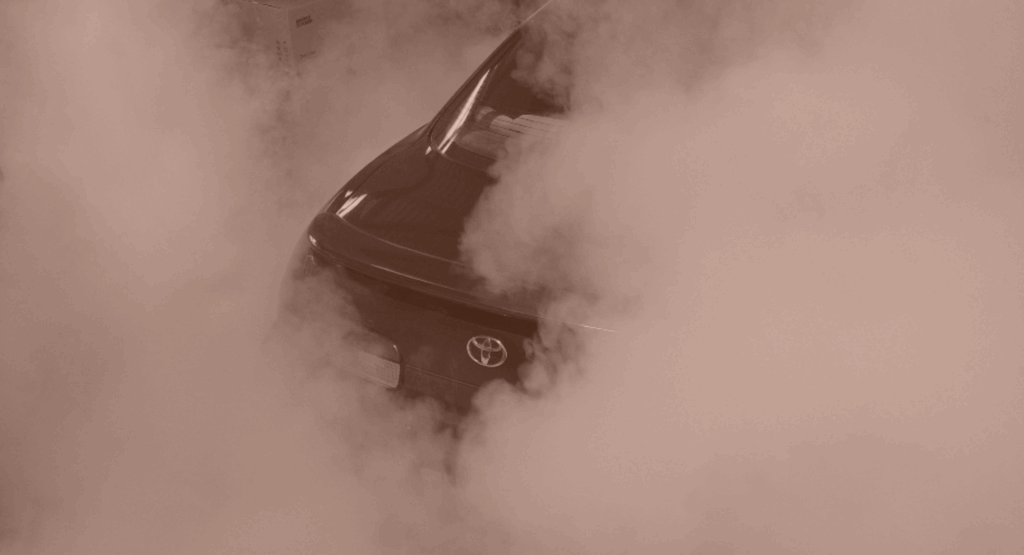 Security smoke with orange covers car