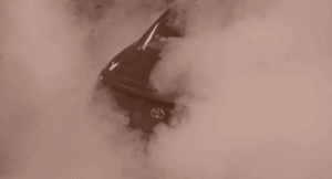Security smoke with orange covers car